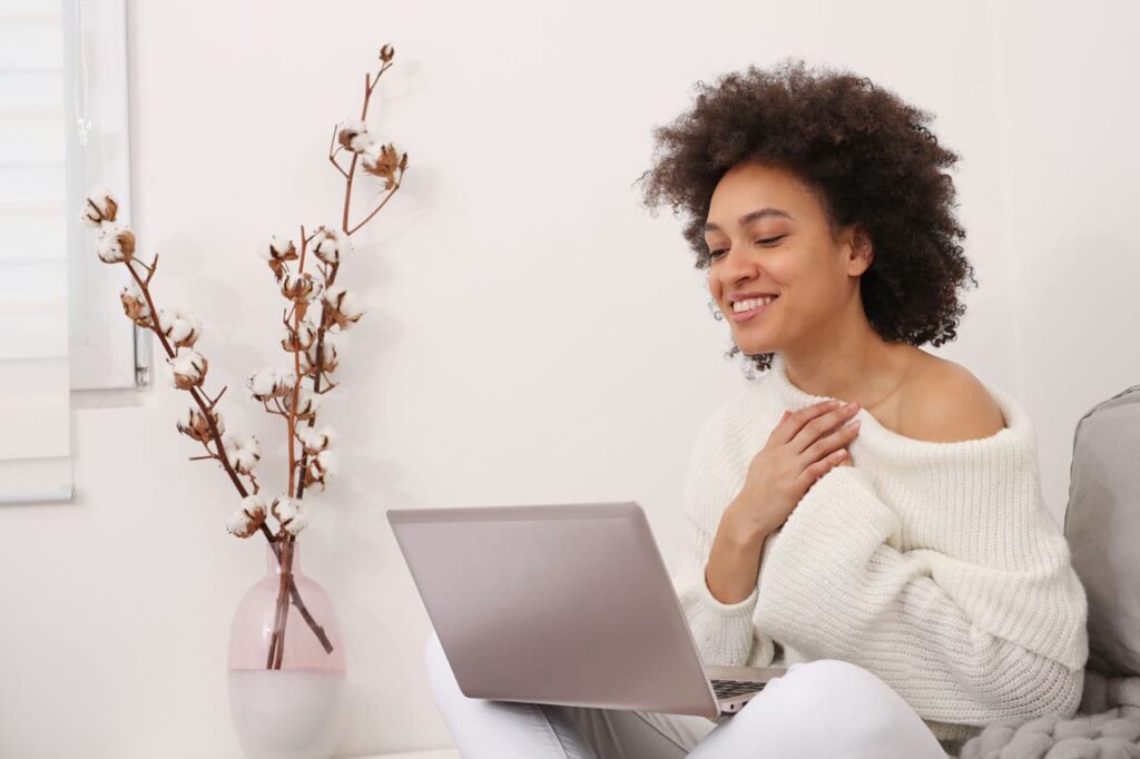 Communication and Connection during Coronavirus lockdown , Self-isolation. Woman using online technology to keep in touch with Friends and Family. Good news and Gratitude concept SSUCv3H4sIAAAAAAAACpyRwW7DIAyG75P2DhHnRkpCl6R7lWoHB0iCSqACsmmq+u4zECrOu+HP9m//5vH+VlVkAicZ+aweIcJYKrU7b8FLoxE3p4NbobmwJRFcemMlqBJO4NmqYRMI9a5UwM+YJM6D351wYdiBGHixoEaCL4m00TXFVU7EJHZgipBTwdw+RZZREv9XZ3p8ZTewCM1+48KFESuUgGTkmkrJ7ccLu5XWYOfSFK6+DQMVCmihdLeSSb0Ubcav8cq5jZldextWeG1OlDF3mFQ48YyaIvMVnMNynnkxiOGfmq2Yo42PBg5VwvEnQtjSjjbduWnGfhgH2rb9UZB+b5WoE9fJQhizm+SldRk2IHChMItmrHnbXepzz6C+nD/mehjpMA+UdtAPePjnHwAAAP//AwDjjaQ1hwIAAA==